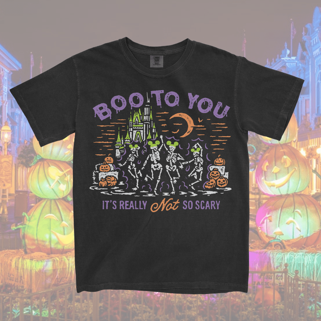 a Not So Scary shirt, a MNSSHP Inspired t-shirt with dancing skeletons and magic castle located in Magic Kingdom located at Disney World and Disneyland. It is part of the Boo To You Parade.