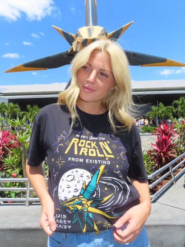 Girl wearing the Cosmic Cosmic Rewind Disney-Inspired tee at Epcot