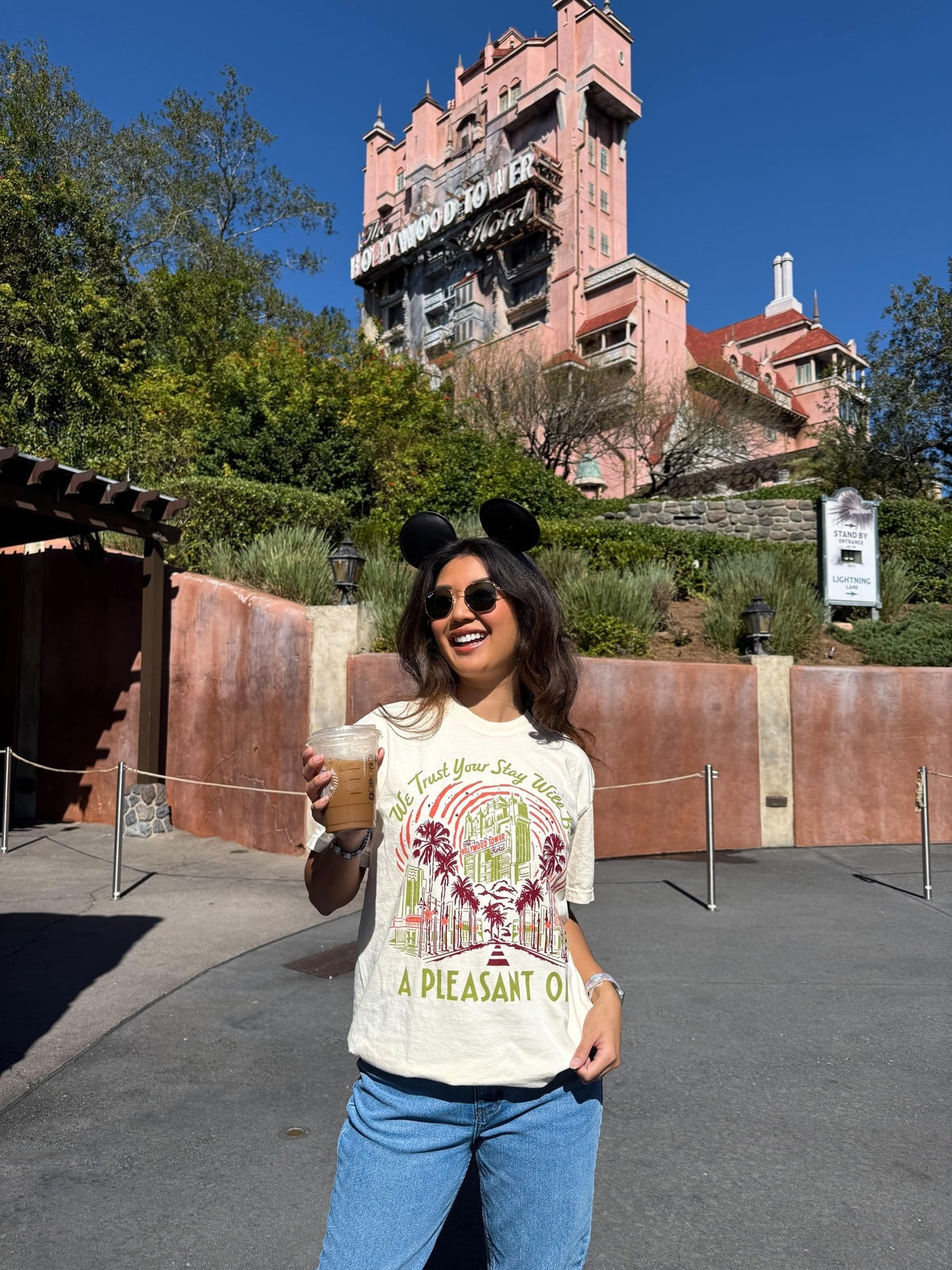 Girl in Mickey Mouse Ears wearing the Take The Stairs Tower Of Terror Disney-Inspired tee at Hollywood Studios